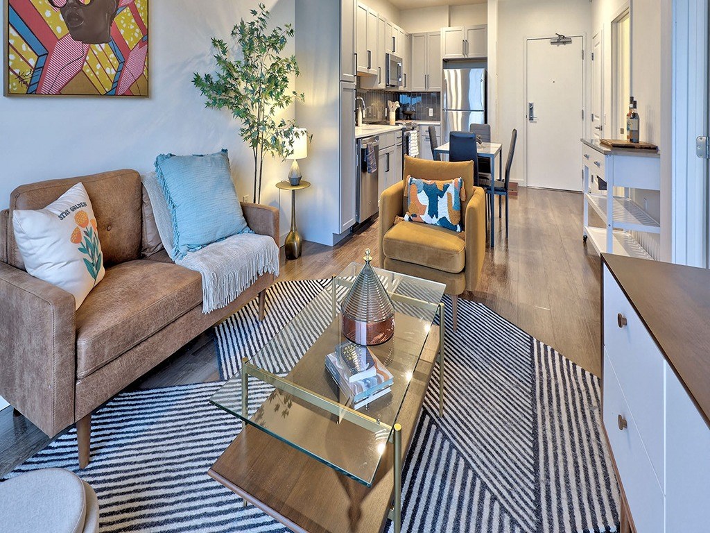 a living room with a couch and a table